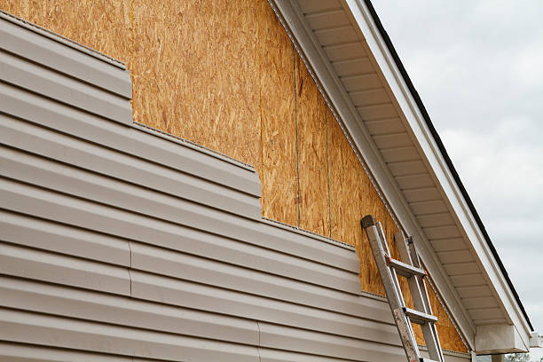Professional Storm Damage Siding Repair technician working in Deal, NJ